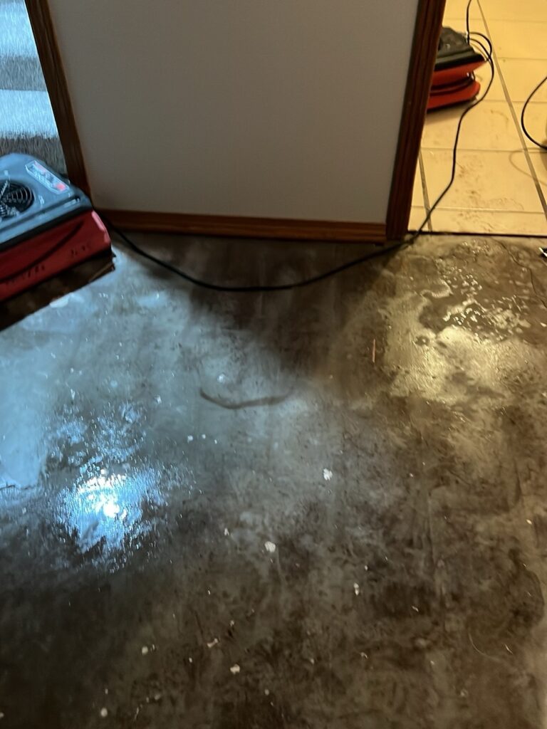 Water damage cleanup in a Wichita basement storage and family room